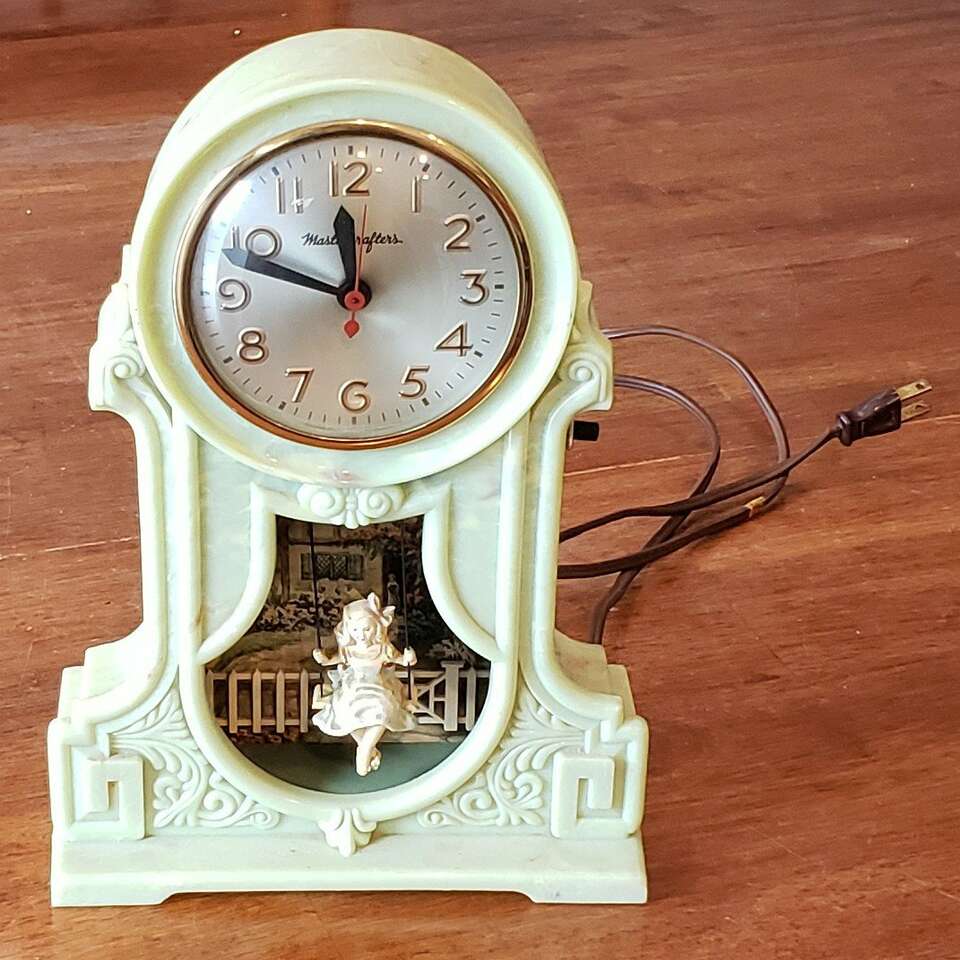 Swinging Girl Clock