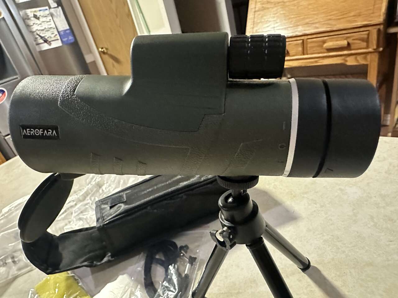 Telescope/Monocular, 40mm lens with attachments for cell phone photos and tripod.