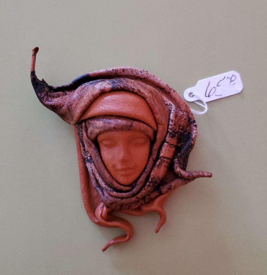 Italian/Spanish Leather Face Pin (signed) with tag