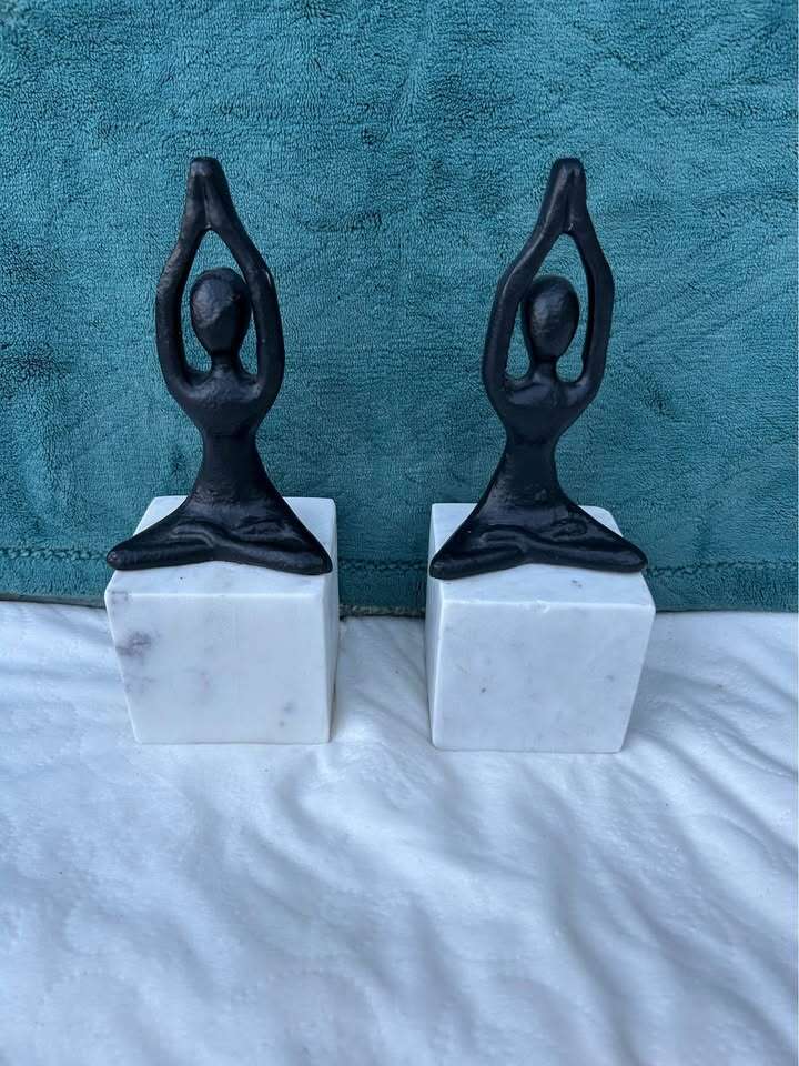 Yoga pose on Marble heavy base bookends $20 cash/Venmo in Draper