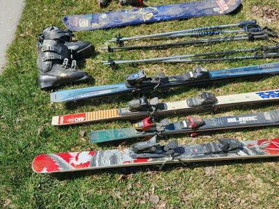 Skiis, Boots, Bindings and poles. And 1 Snowboard.