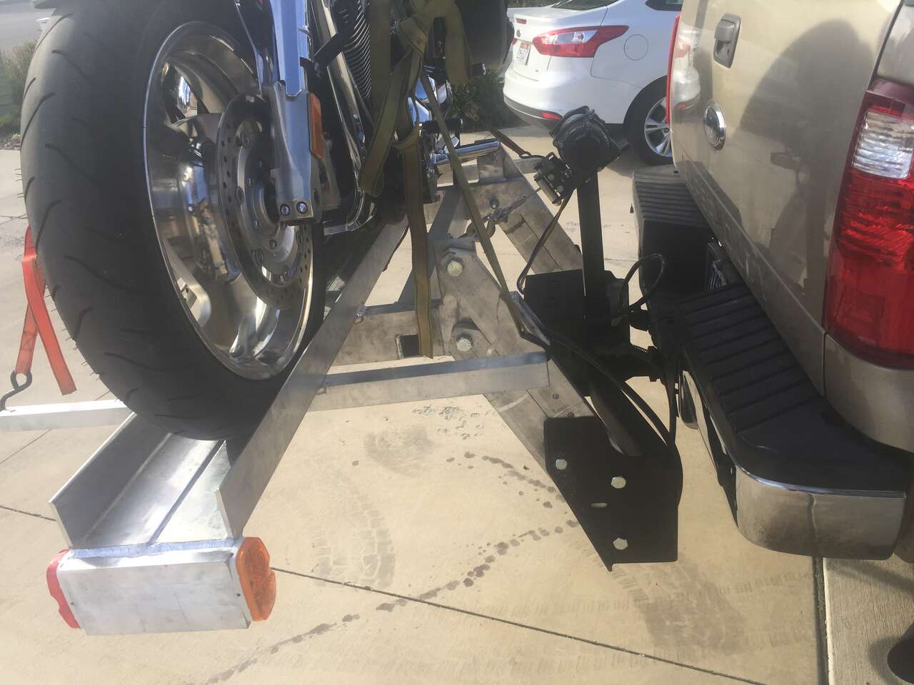 Motor cycle lift for RV,  Storage and carrier