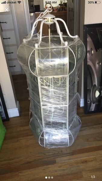 Huge chandelier with 3 sets of lights.