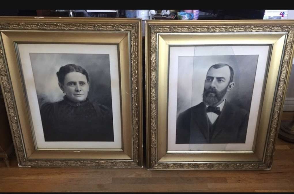 Very old well dressed couple in charcoal portraits