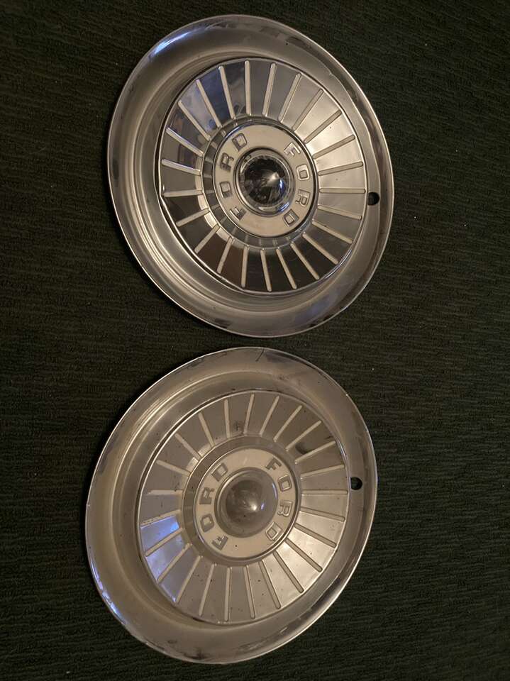 Two Vintage Metal Ford Hubcaps