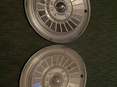 Two Vintage Metal Ford Hubcaps