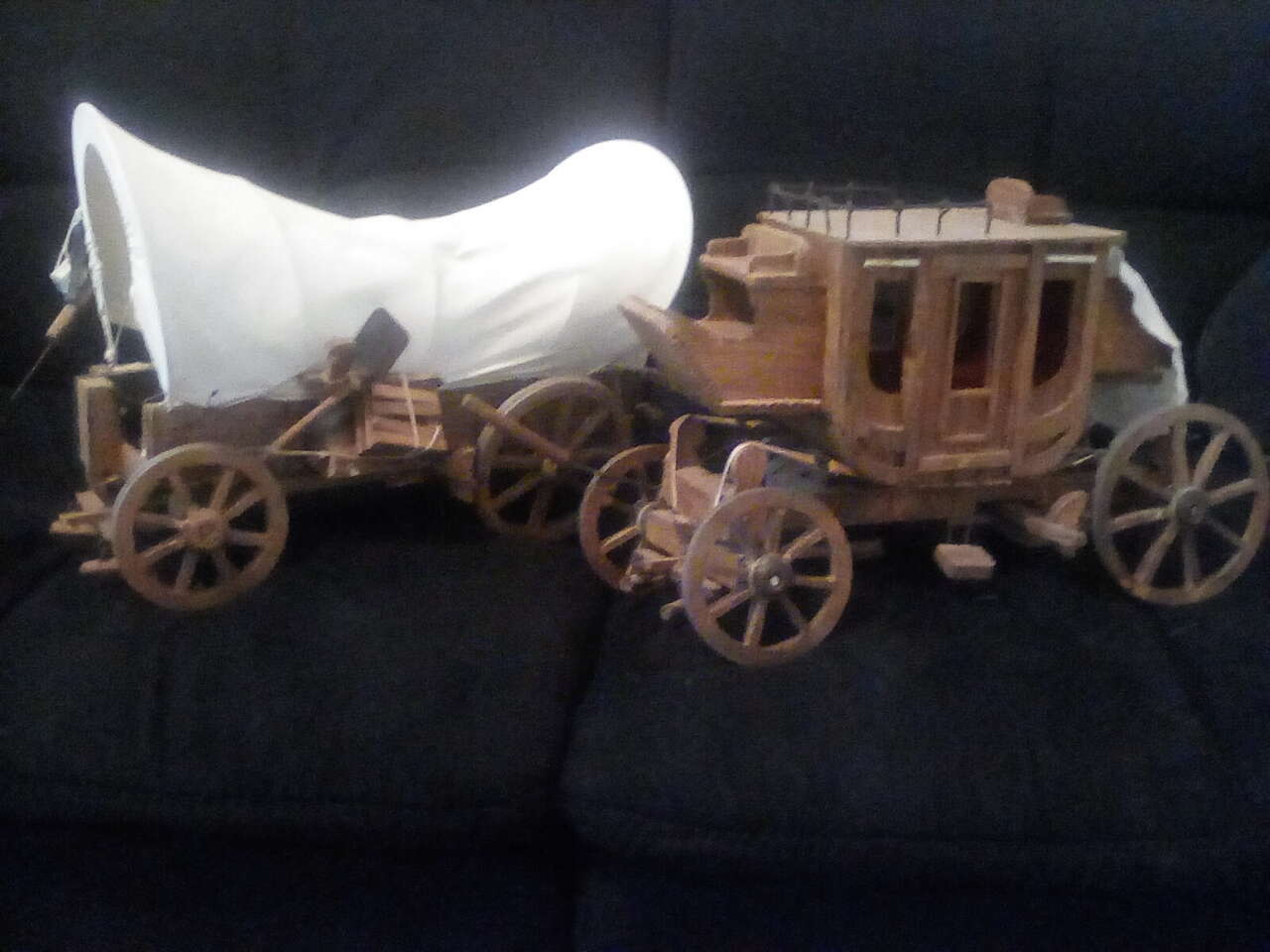 Vintage covered wagon and stagecoach