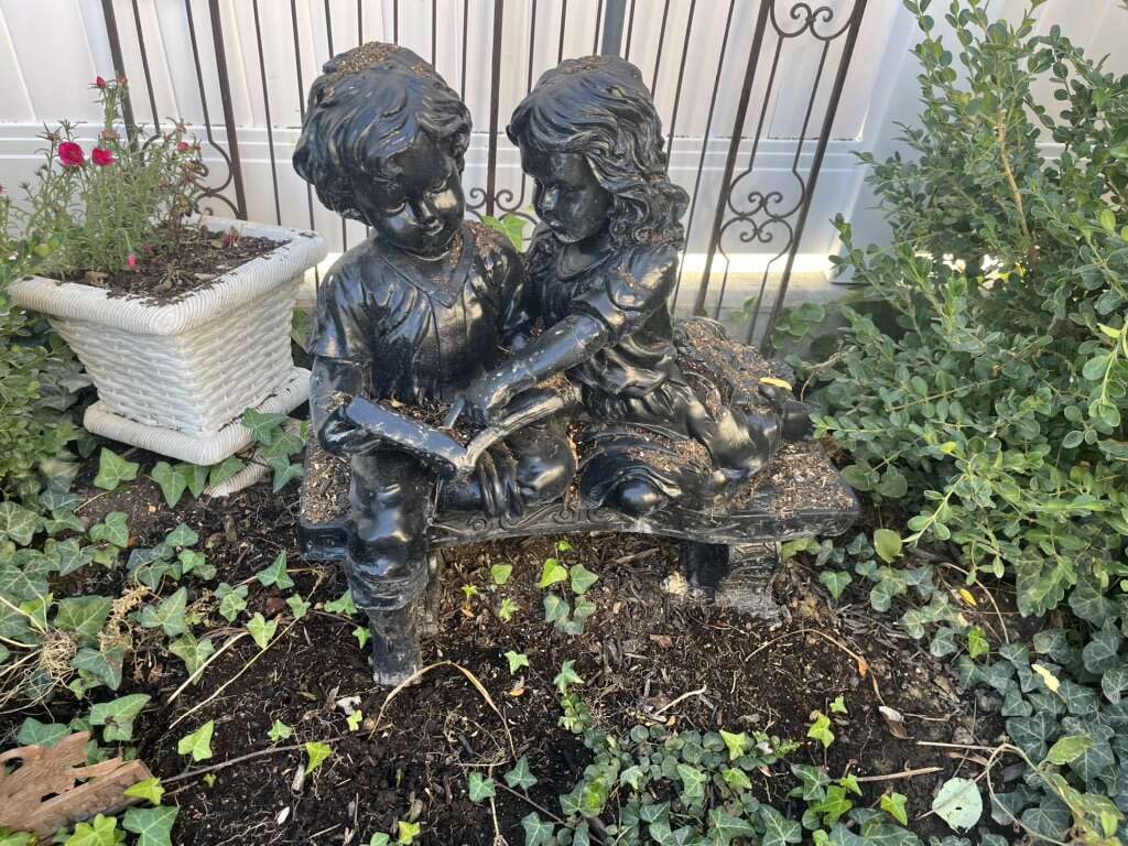 Resin Girl And Boy Statue On The Bench