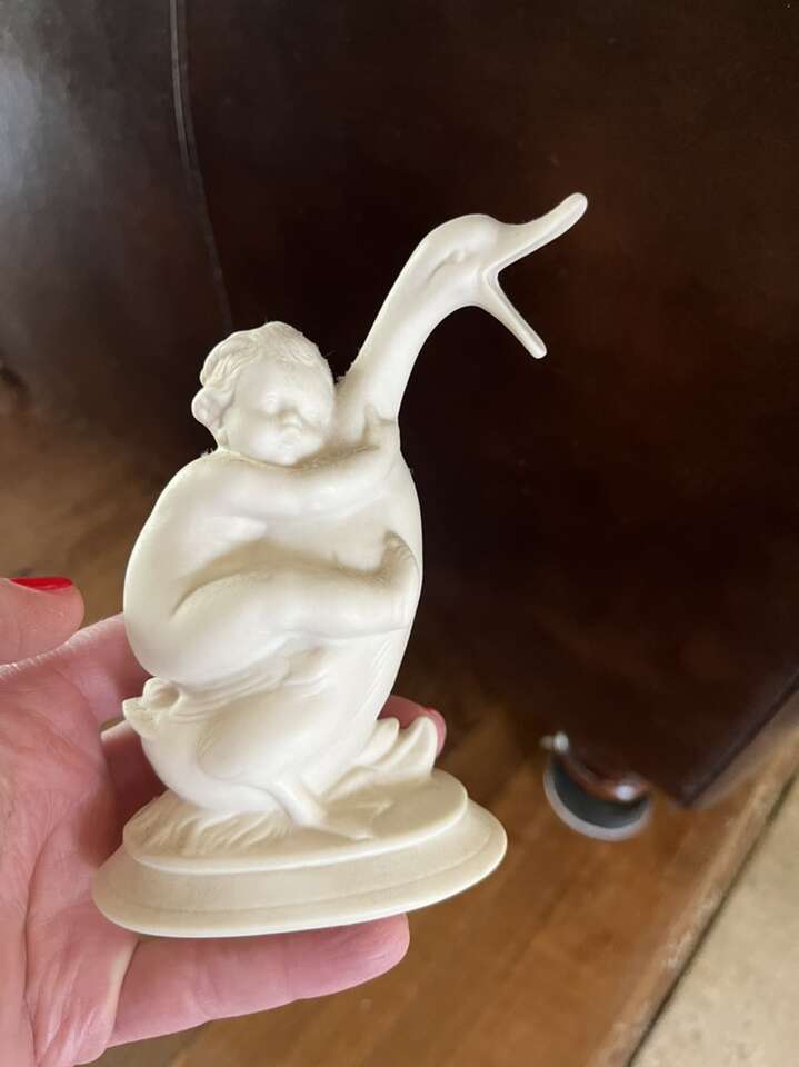 Ceramic Baby On Duck 5 Tall Cream Colored