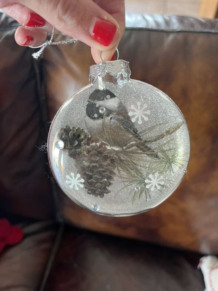 Ornament glass with bird on a pinecone 4”