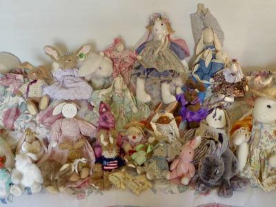 Several Stuffed Easter Bunny Rabbit Dolls With Fabric Clothes To Play With Or For Fun Decor-