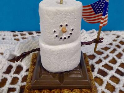 Patriotic Marshmallow Graham Cracker Chocolate Smores Pottery Ornament Decor Holding A USA Flag
