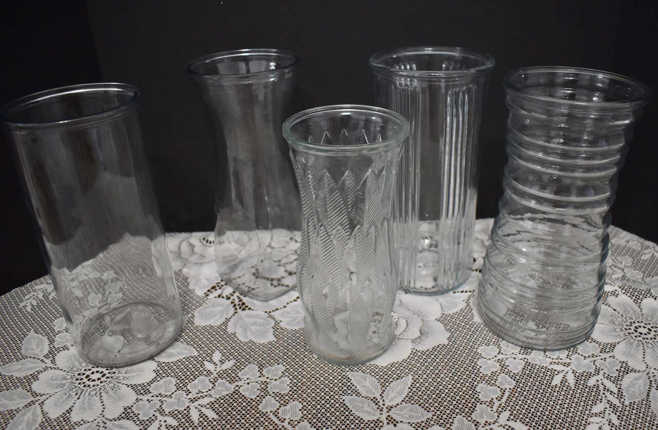 SEVERAL VERY PRETTY GENTLY USED TALLER GLASS FLOWER VASES