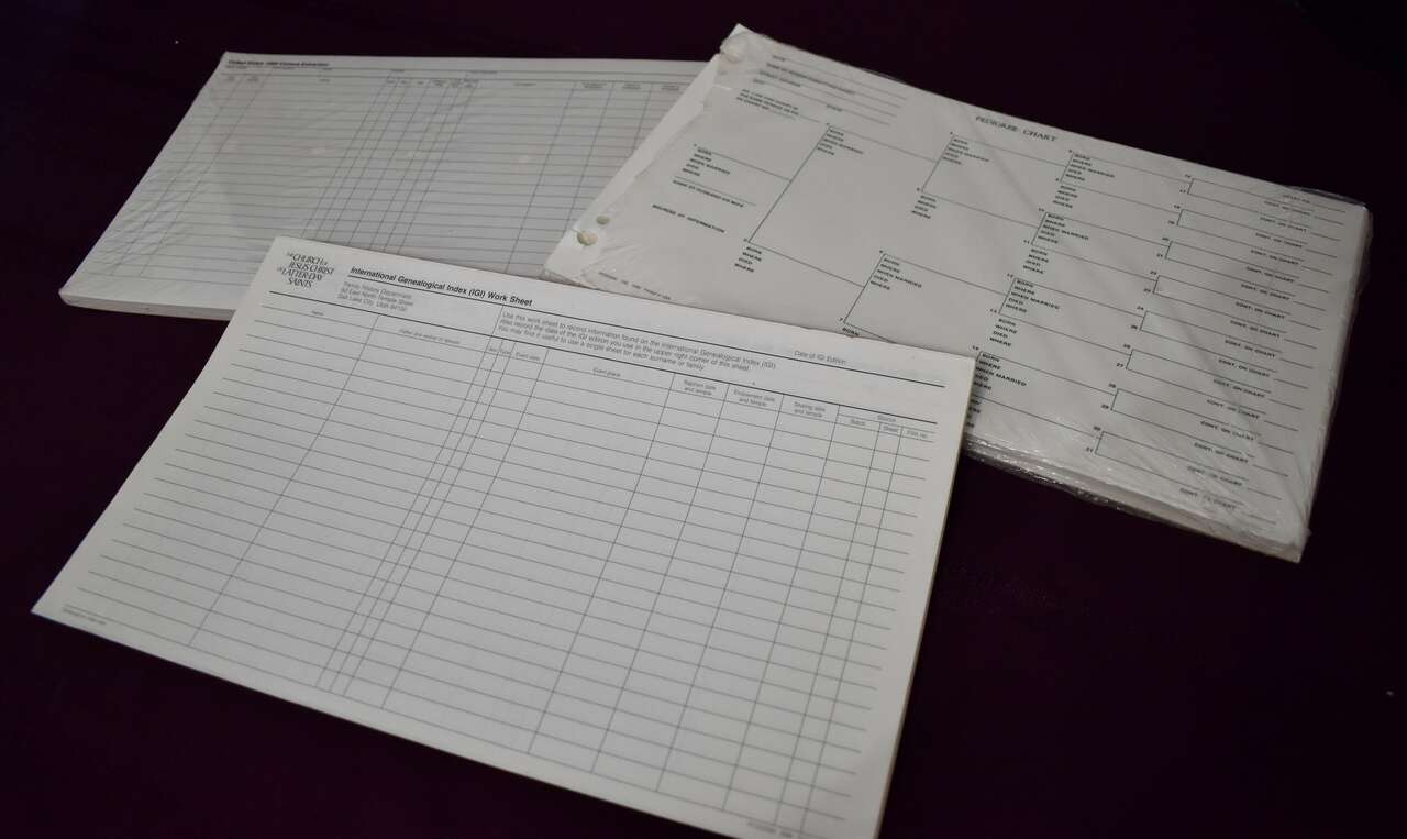 Several Different Vintage LDS Genealogy Paper Packets With Pedigree Chart Papers That Measure 14 Inches Wide X 8 1/2 Inches Tall