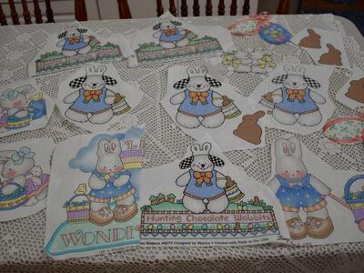 SEVERAL CUT OUT COTTON FABRIC PIECES THAT DEAL WITH EASTER WITH BUNNIES, EGGS AND MORE FOR CRAFTS
