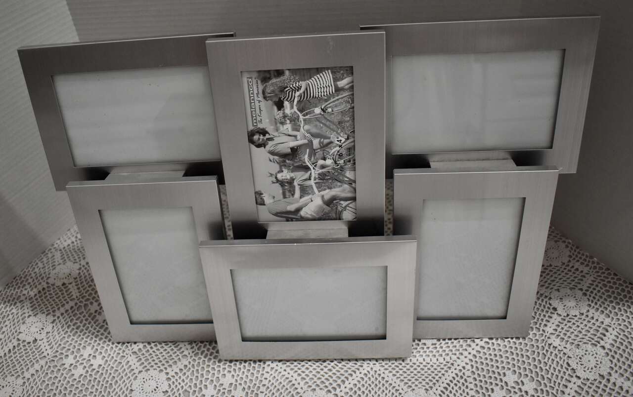 Beautiful 6 Photo Silver Colored Modern Looking Hanging Wall Frame For Fun Decor