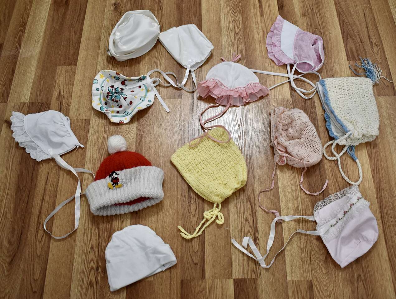 SEVERAL VINTAGE BABY HATS AND BONNETS- WITH ONE TODDLER MICKEY MOUSE HAT