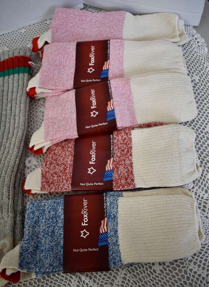 Two Pink Socks And AN X Large Gray Sock W/ A Red/Green Top To Make Sock Monkeys With A Free Pattern