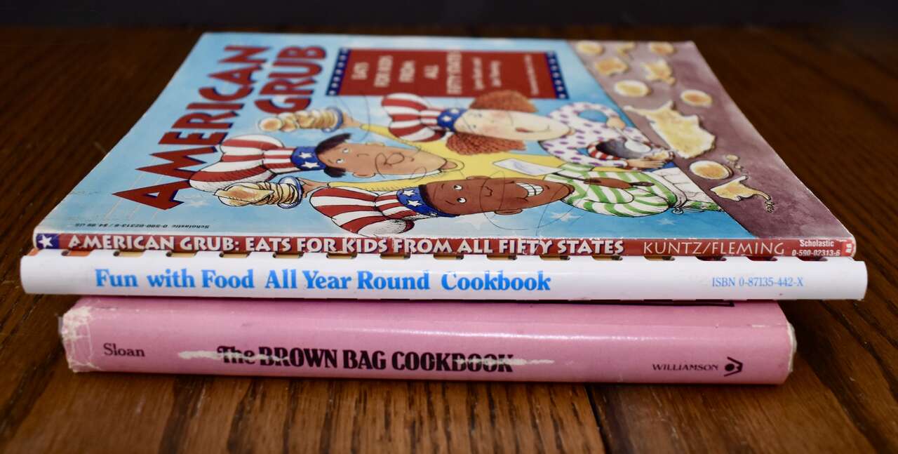 A LOT OF 3 REALLY FUN COOKBOOKS WITH LOTS OF RECIPES FOR CHILDREN AND ADULTS