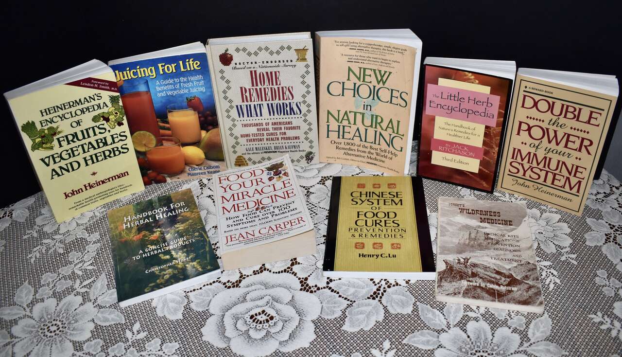 SEVERAL ASSORTED BOOKS DEALING WITH YOUR HEALTH, WELLNESS AND MORE