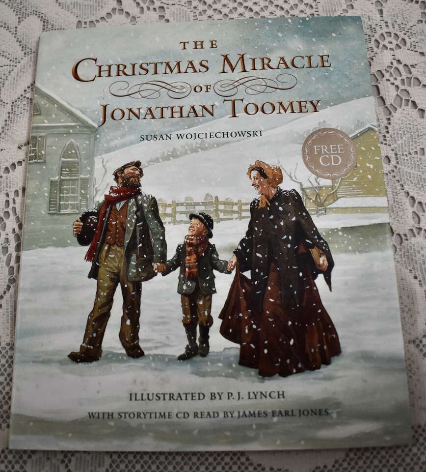 THE CHRISTMAS MIRACLE OF JONATHAN TOOMEY - 1995 HARDBACK WITH A CD