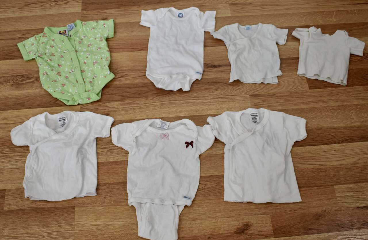 Several Vintage Baby Under Shirts And Also Some One Piece With Tops And Bottoms Attached