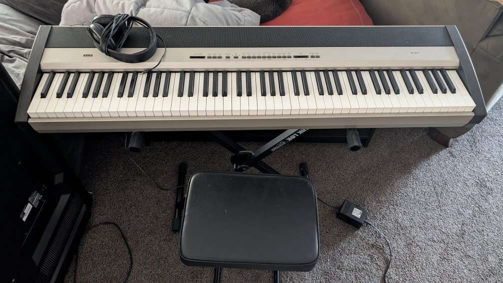 Korg SP-300 electronic keyboard piano