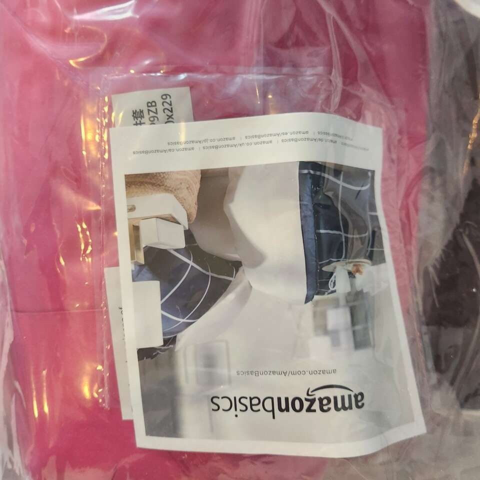 2 Pink reversible twin comforters