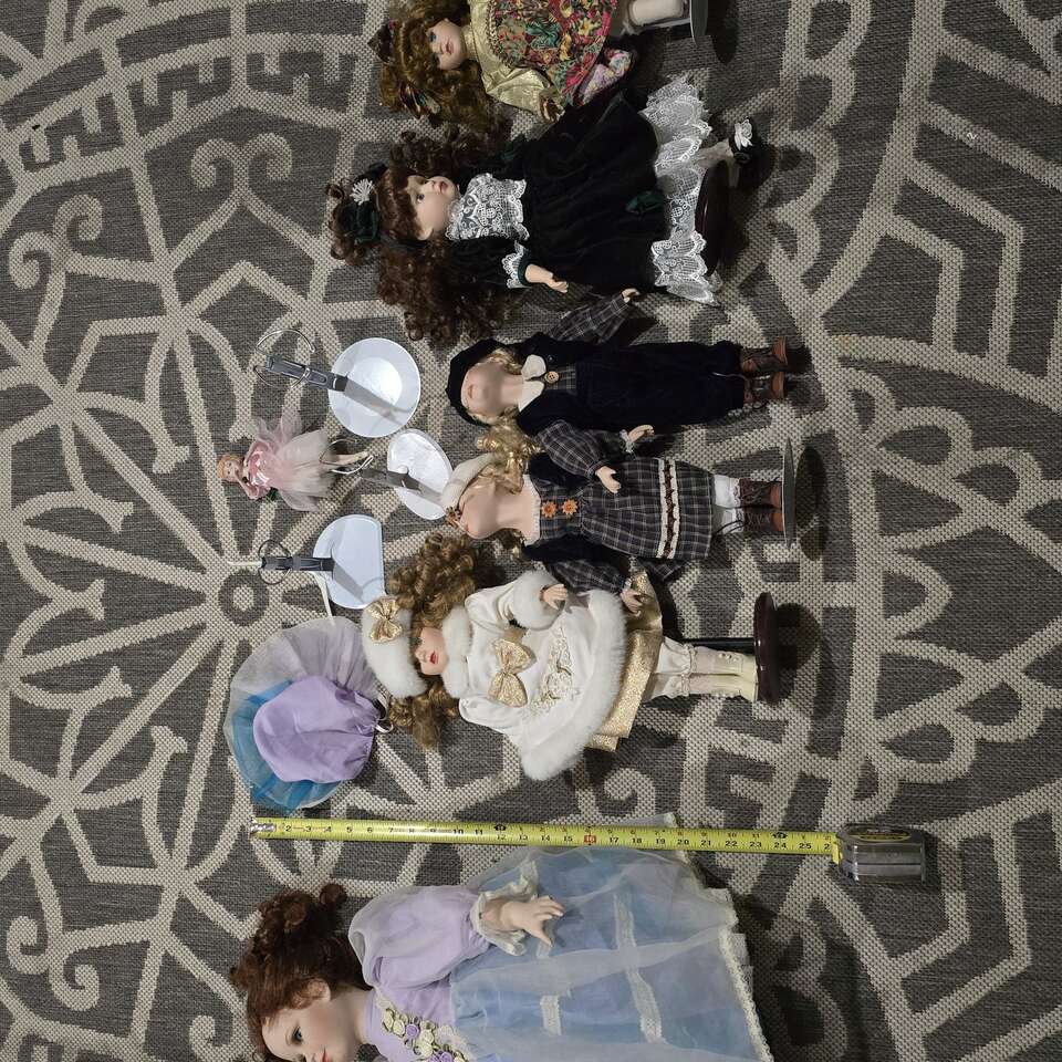 7 porcelain dolls