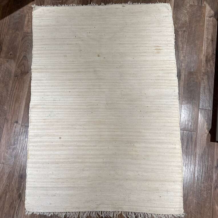Rug 75” X 55”