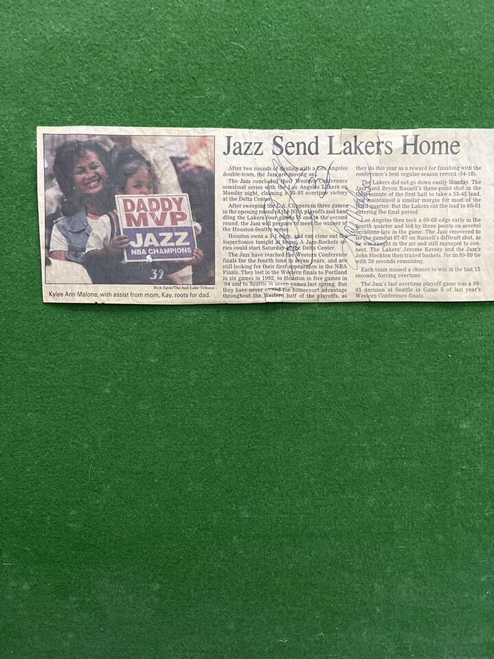 Signed Newspaper Article By Karl and Kay Malone