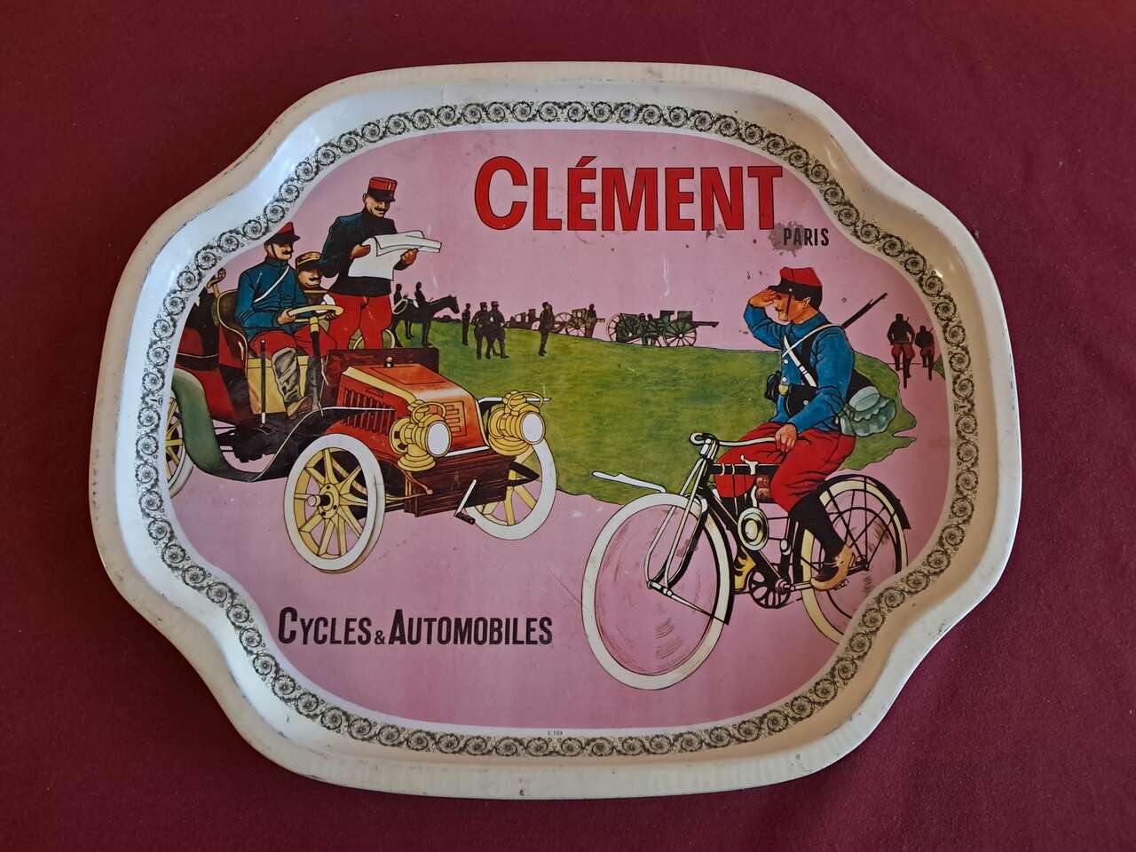 Vintage Clement metal serving tray.