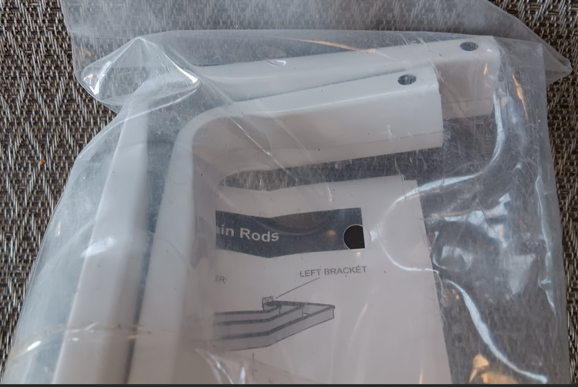 New still in the package. Double Lockseam Curtain Rod 48 to 84 inches, White.