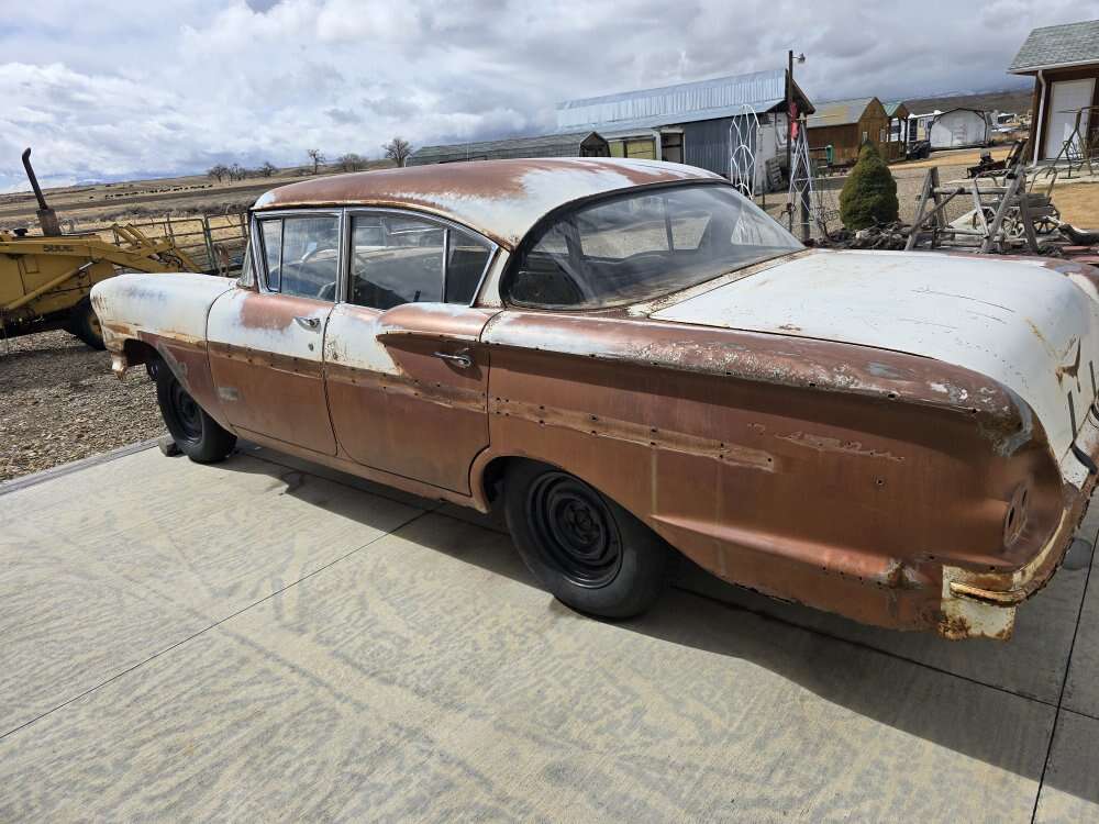 1958 chevy belair 4 door sedan make a offer