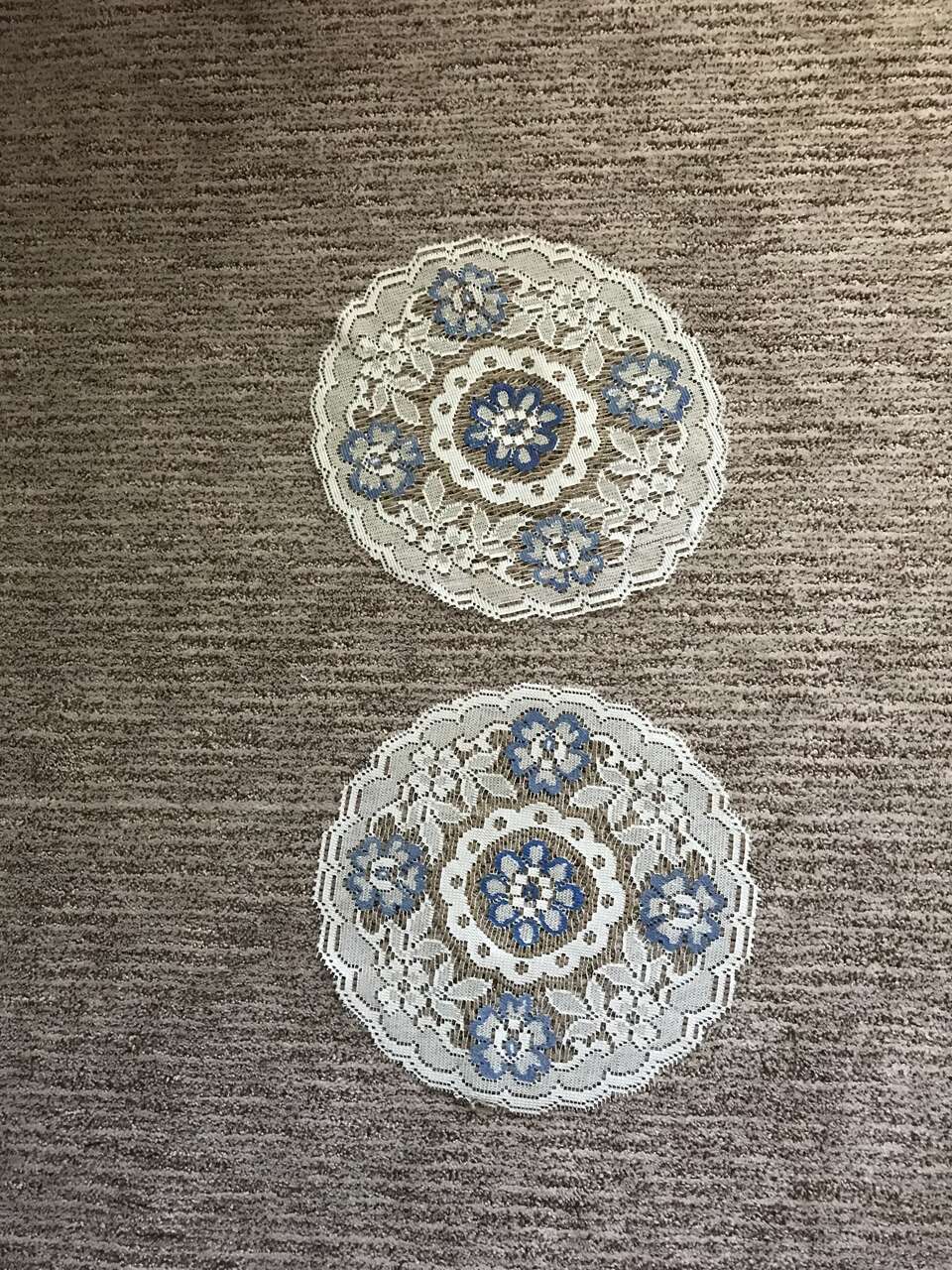 White and blue flowered doilies- two round ones