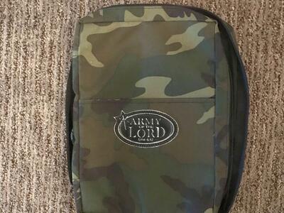 Book holder with handle and zipper that holds the book inside - Army of the Lord