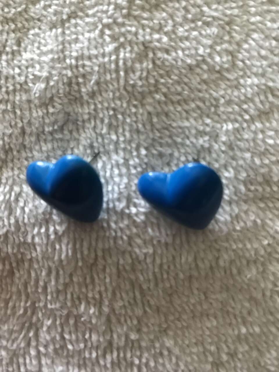 Heart shaped earrings blue in color