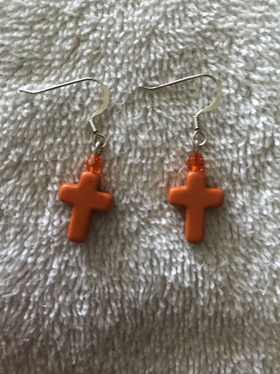 Cross shaped earrings - Orange in color - BRAND NEW