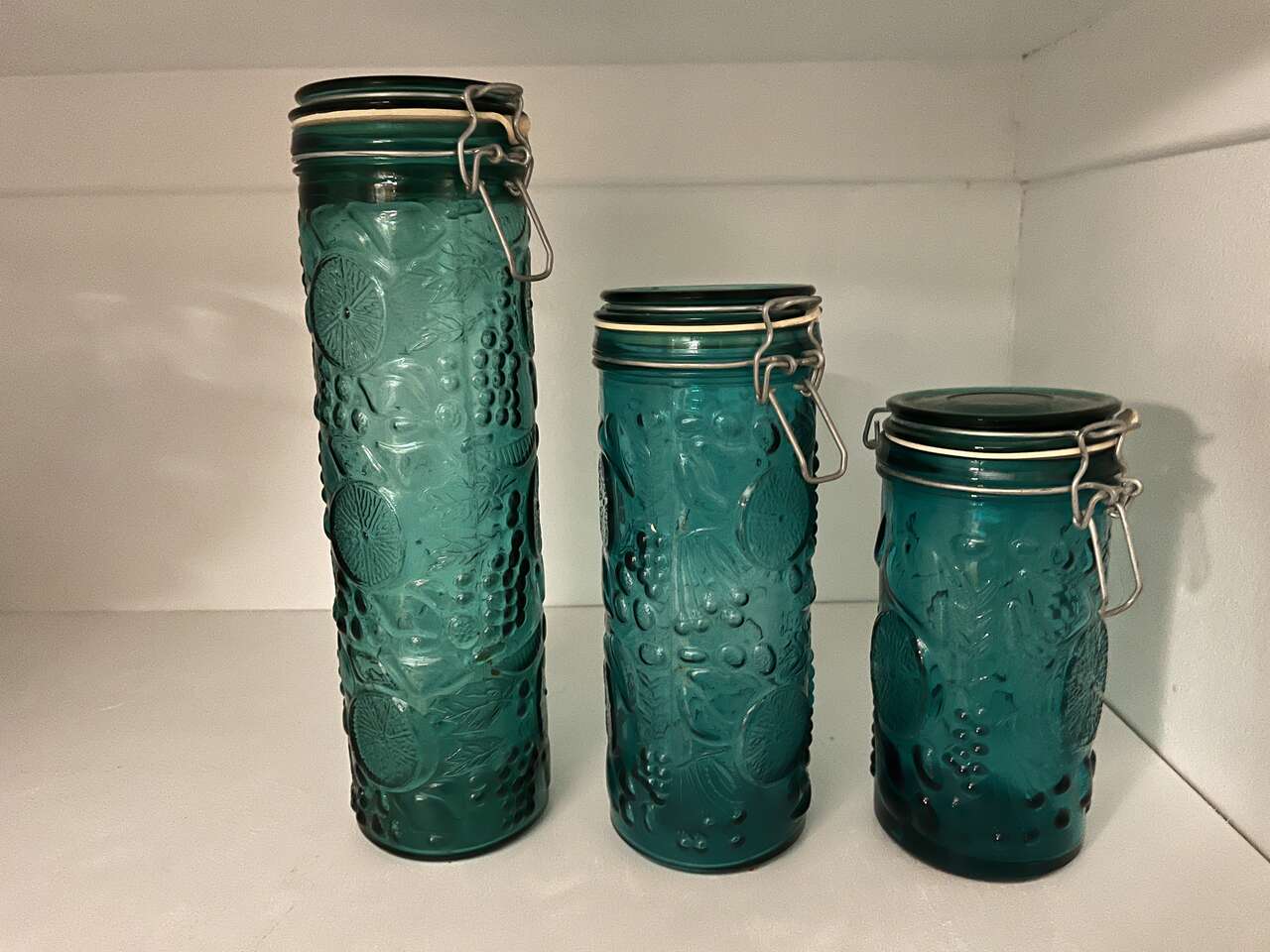 Glass storage canisters
