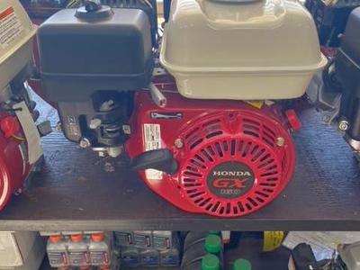 Honda GX-160 new motor with horizontal 5/8 smooth shaft with keyway