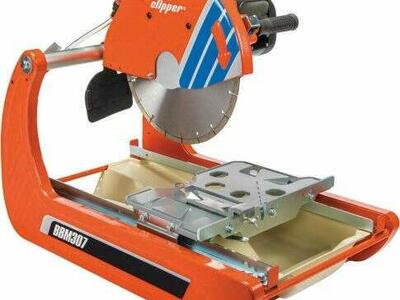 New Norton Clipper 14 inch saw with wet kit