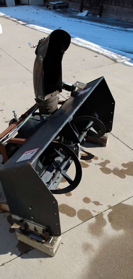 Snow thrower attachment