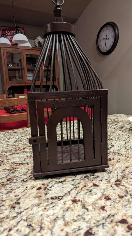 Wooden birdcage.
