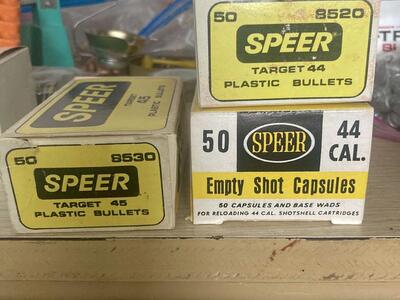 Vintage Speer shot shell capsules and plastic bullets