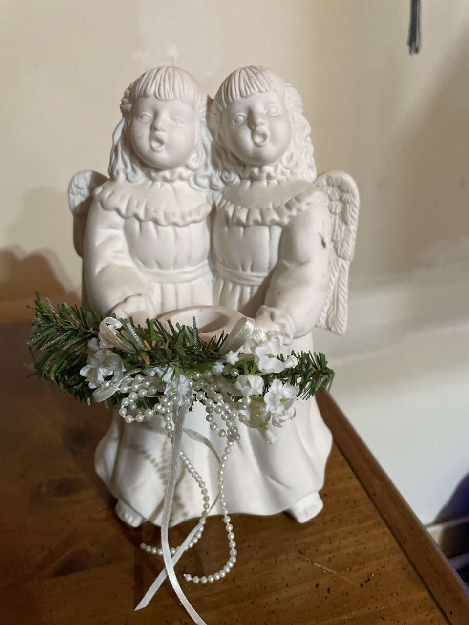 Ceramic angels statue growth 1997