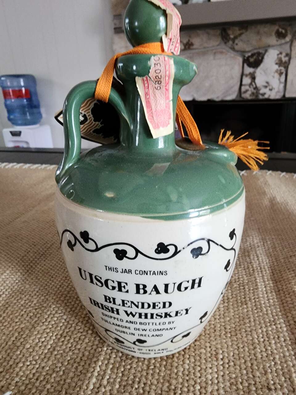Old antique ceramic whiskey bottle