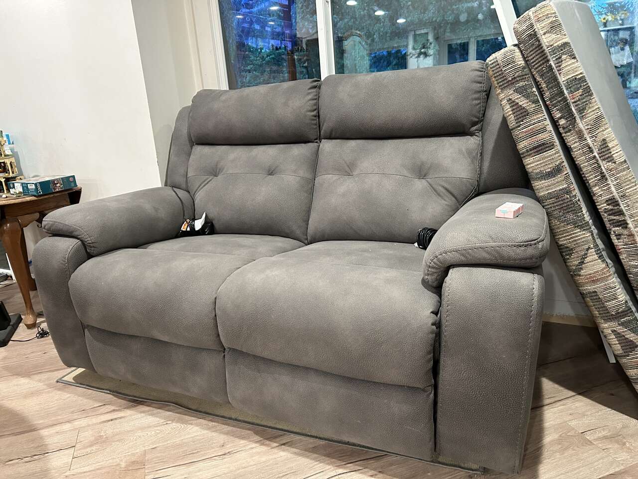 Two matching loveseats power recline