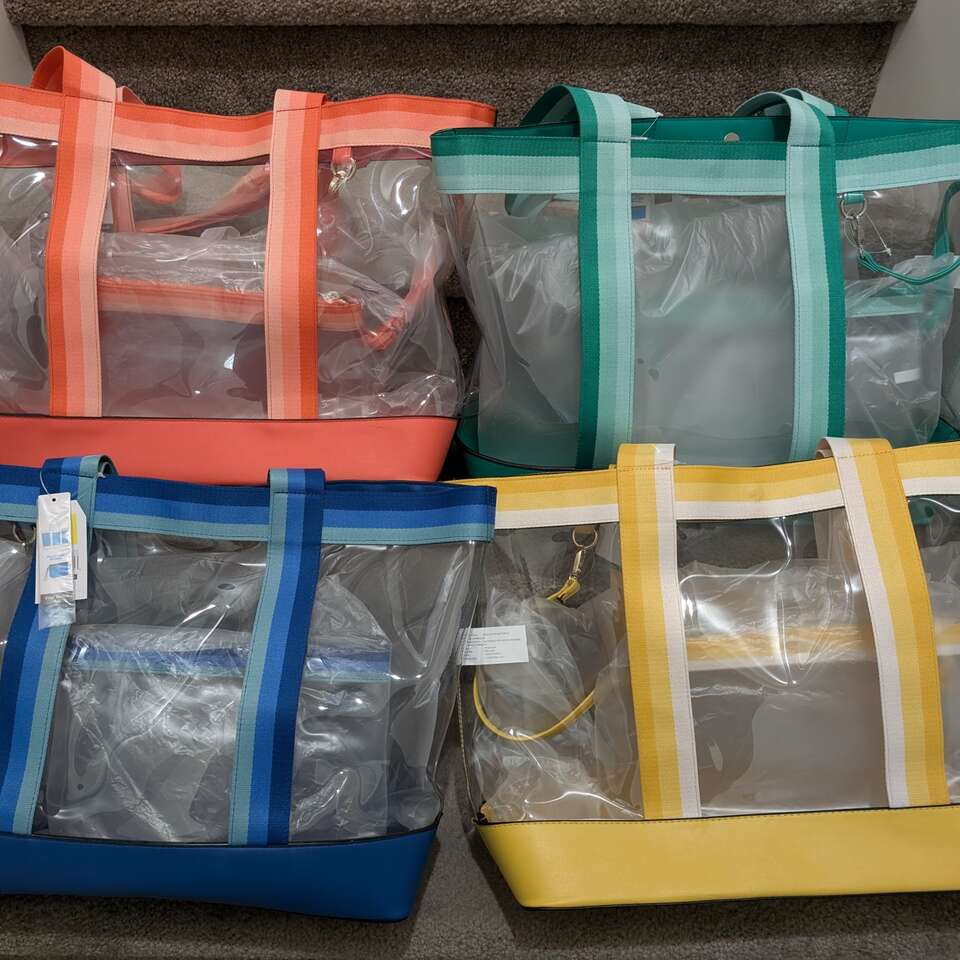 Clear totes with removable zipper pouch