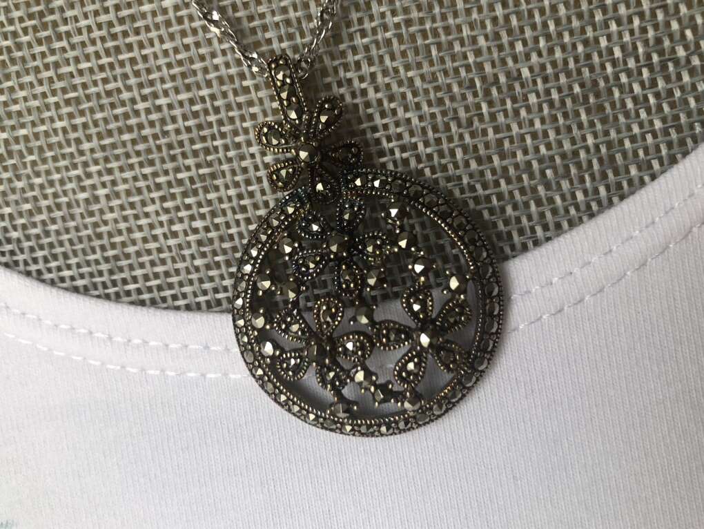 Suspicion Marcasite Domed Open Floral Pendant