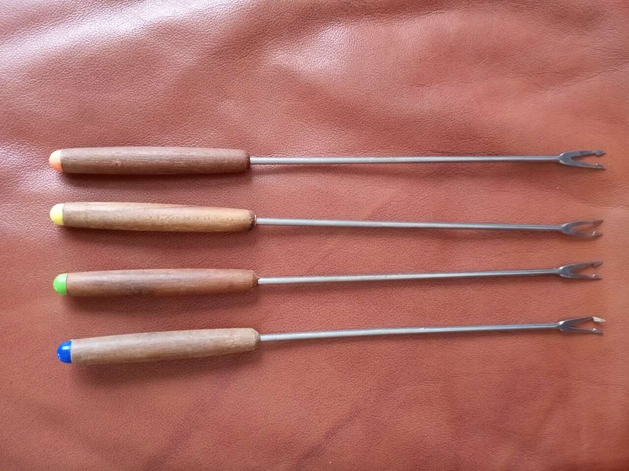 Vintage teak fondue forks